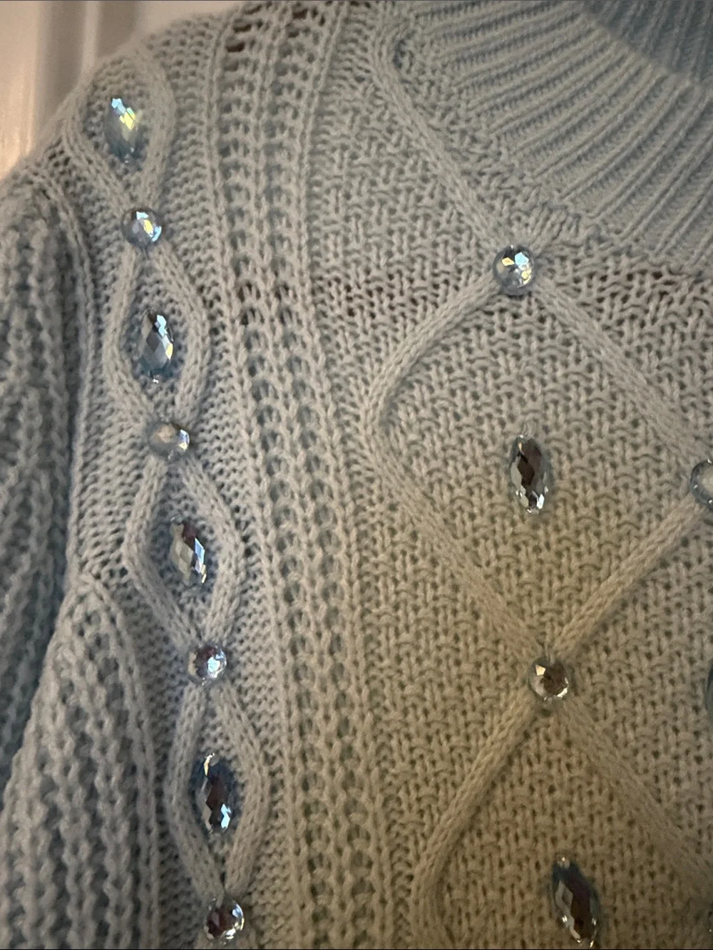 Elegant Light Blue Knit Sweater with Embellishments